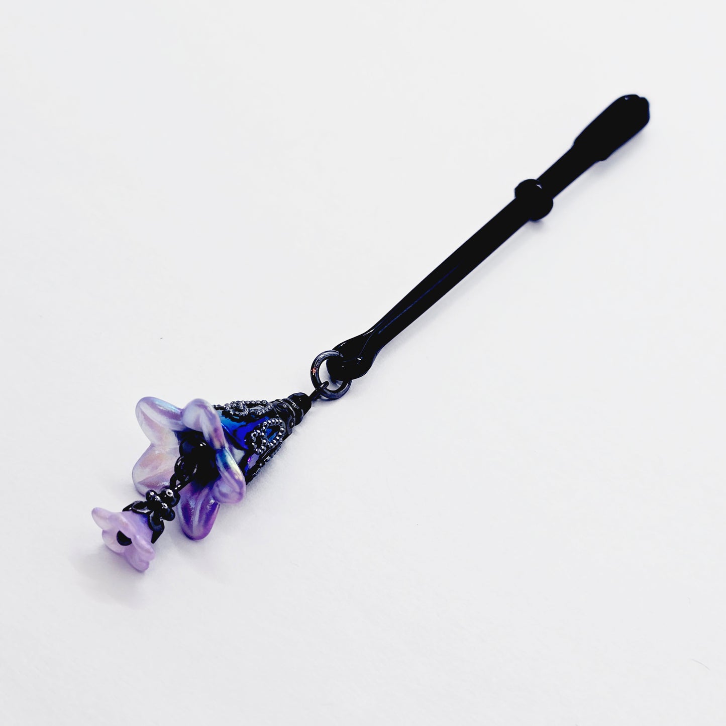 Floral Clitoral Clamp. Black Tweezer Clit Clamp with Purple Flower Dangle.