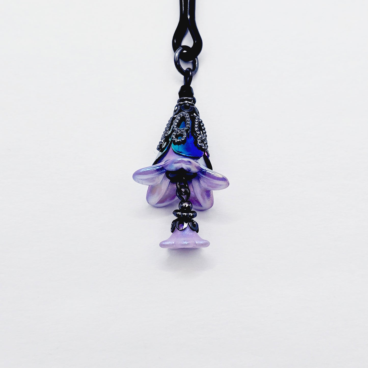 Floral Clitoral Clamp. Black Tweezer Clit Clamp with Purple Flower Dangle.