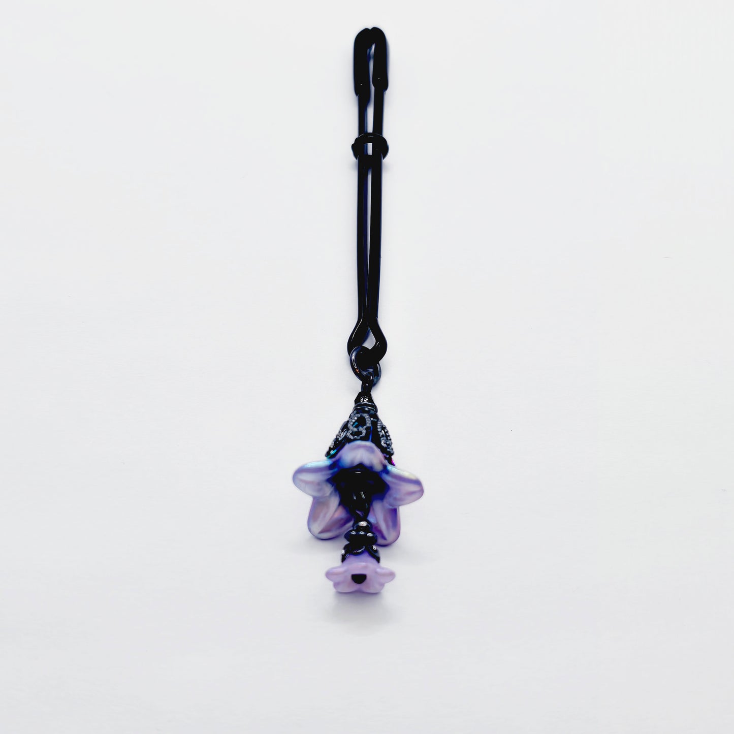 Floral Clitoral Clamp. Black Tweezer Clit Clamp with Purple Flower Dangle.