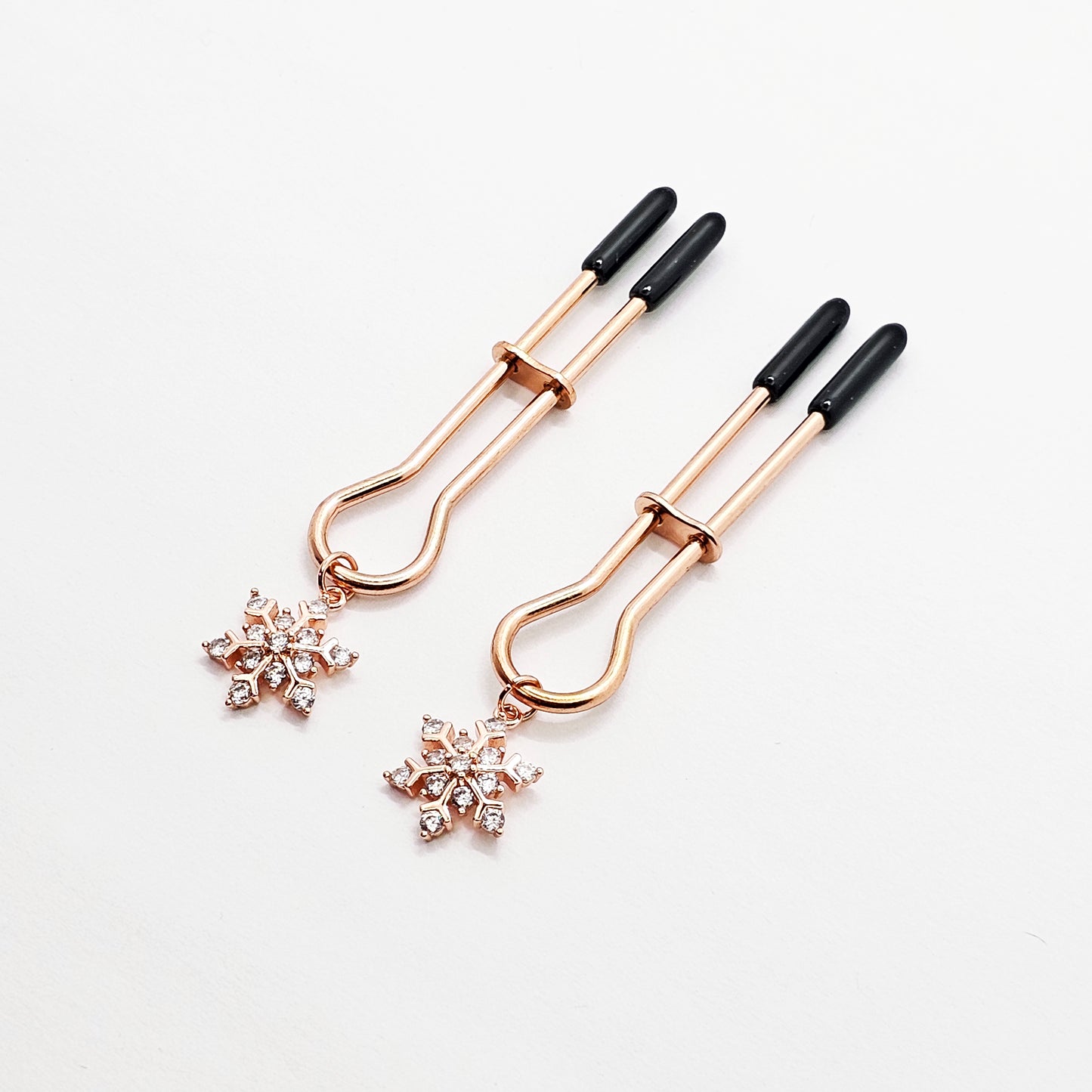 Rose Gold Nipple Clamps with Sparkling Snowflakes. Straight Tweezer Style Clamps.