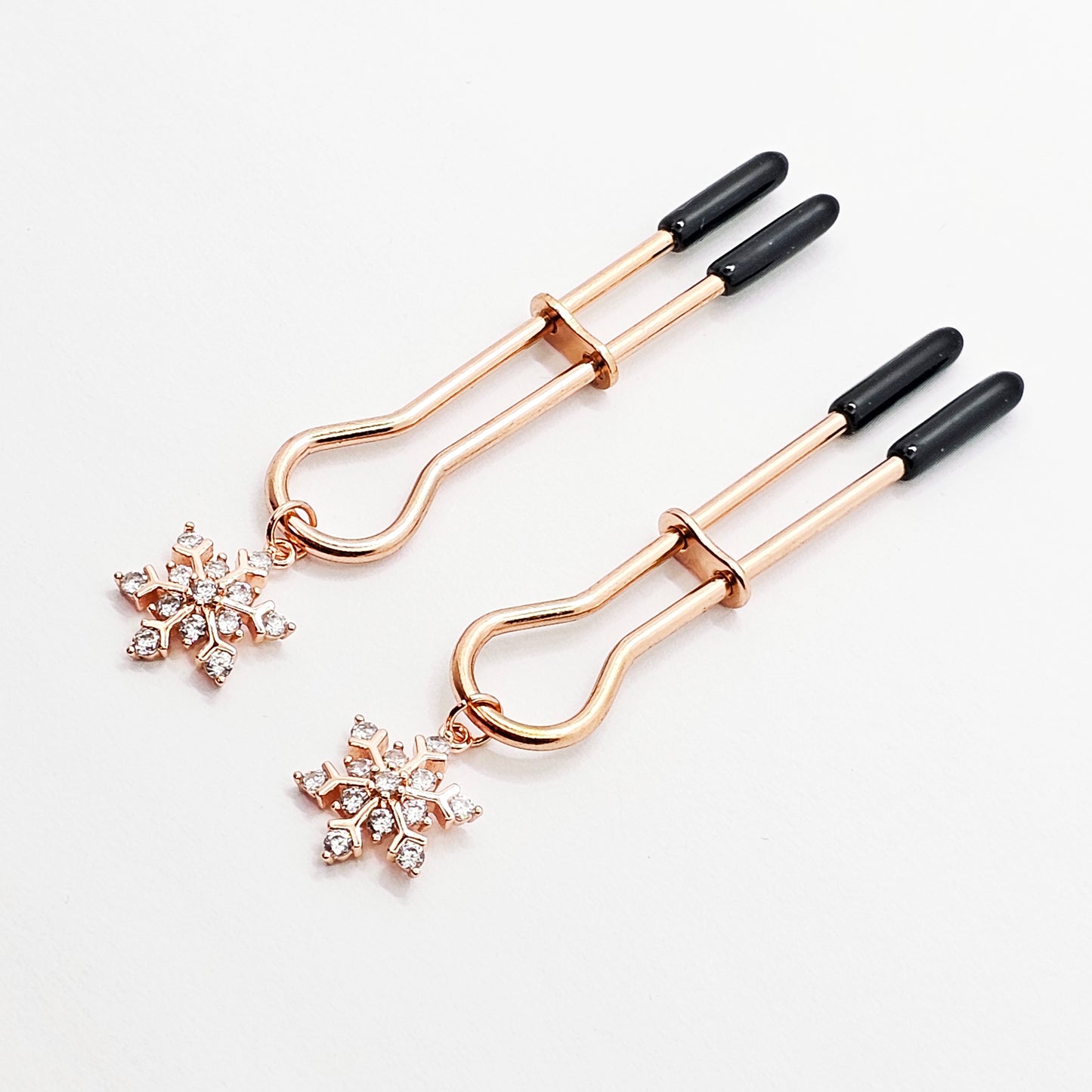 Rose Gold Nipple Clamps with Sparkling Snowflakes. Straight Tweezer Style Clamps.