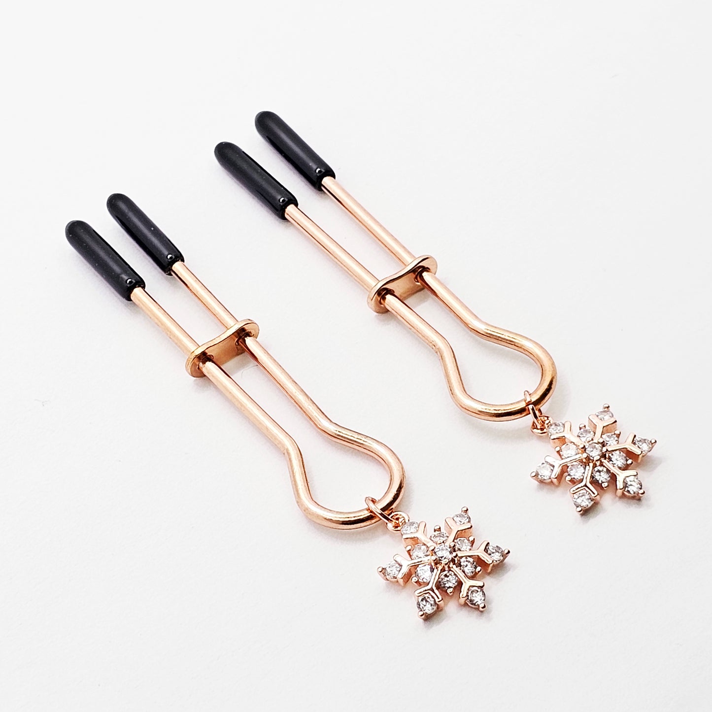 Rose Gold Nipple Clamps with Sparkling Snowflakes. Straight Tweezer Style Clamps.