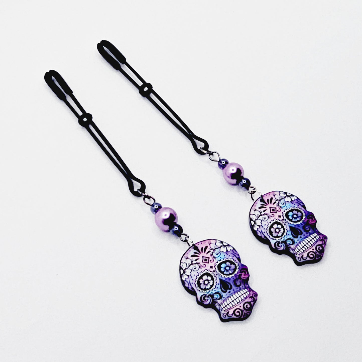 Sugar Skull Nipple Clamps. Black Tweezer Nipple Clamps with Pretty Pearl Beads and Skulls.