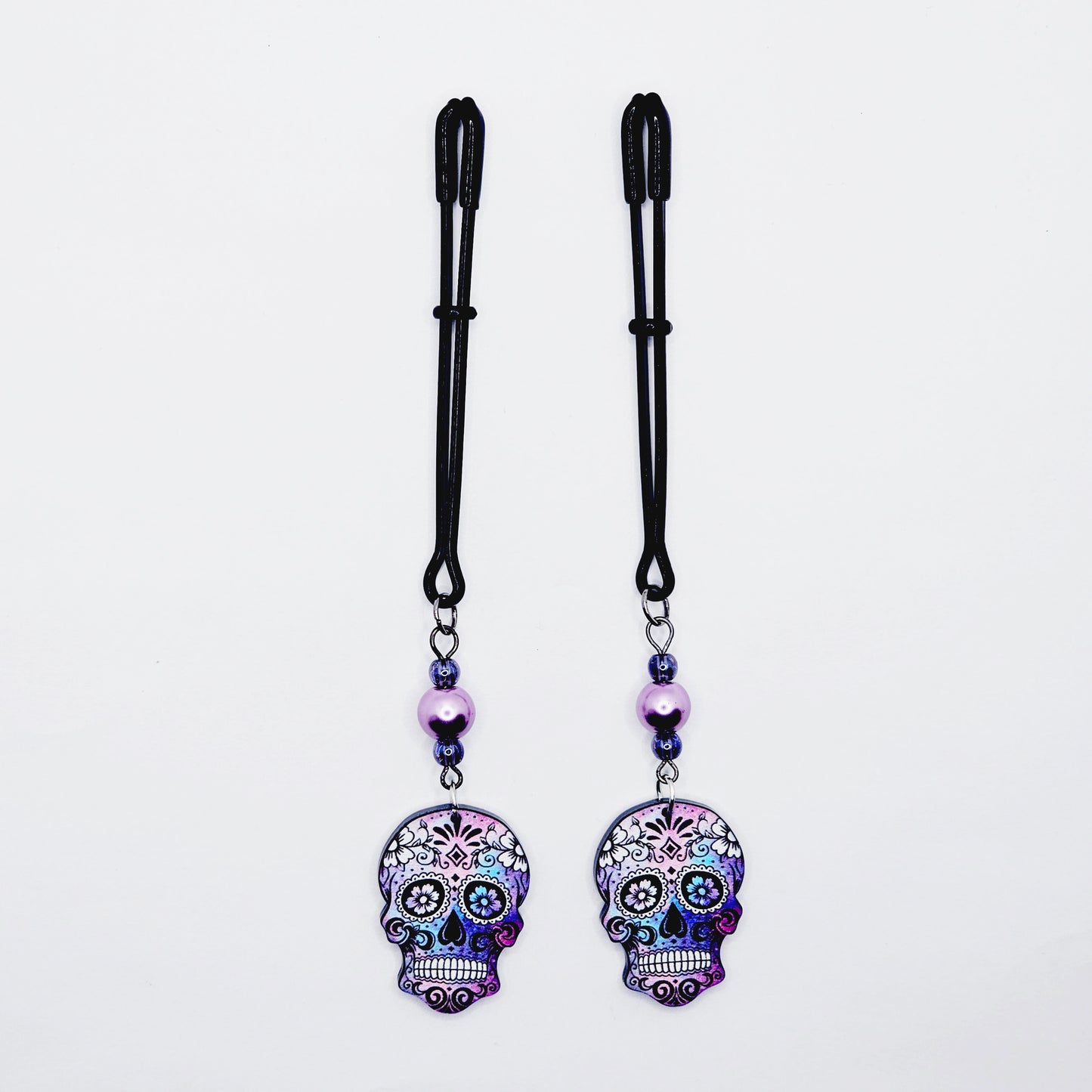 Sugar Skull Nipple Clamps. Black Tweezer Nipple Clamps with Pretty Pearl Beads and Skulls.