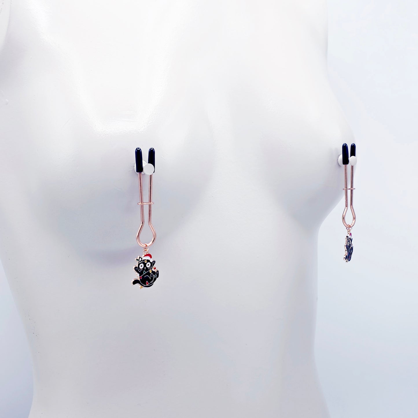 Holiday Nipple Clamps. Rose Gold Straight Tweezer Clamps with Naughty Christmas Kittens.