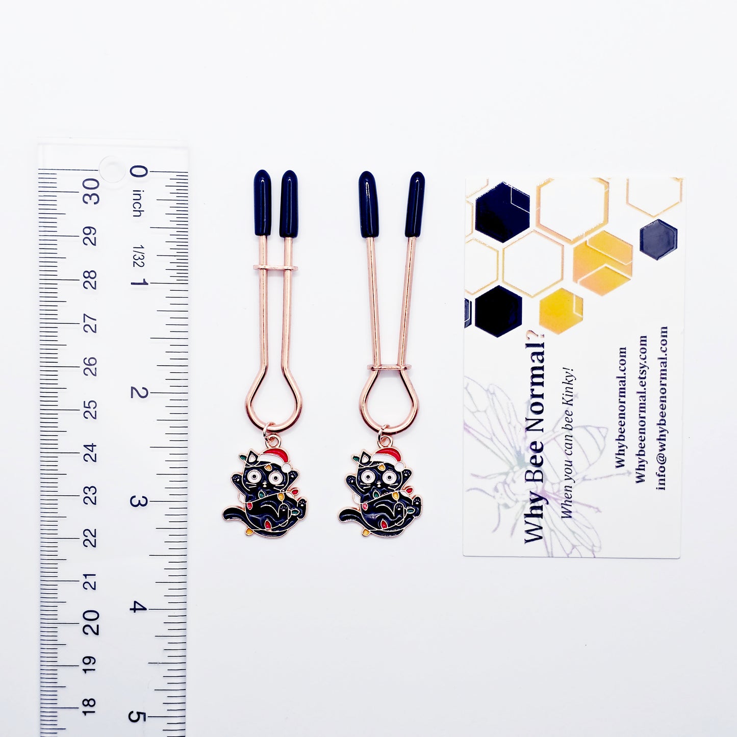 Holiday Nipple Clamps. Rose Gold Straight Tweezer Clamps with Naughty Christmas Kittens.
