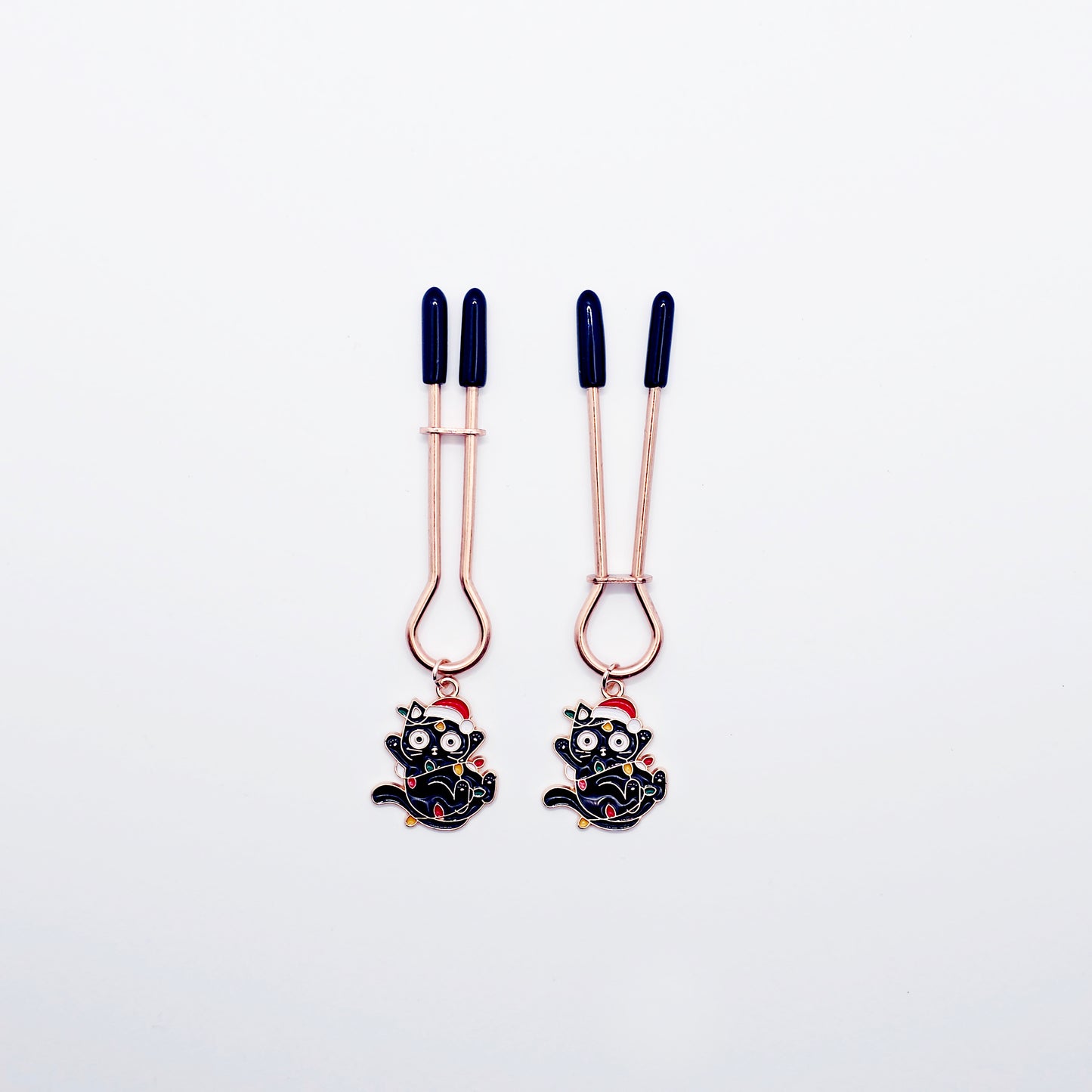 Holiday Nipple Clamps. Rose Gold Straight Tweezer Clamps with Naughty Christmas Kittens.