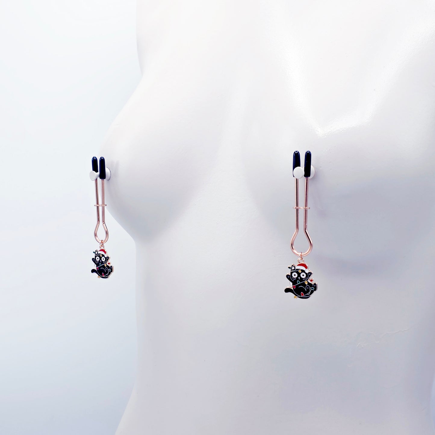 Holiday Nipple Clamps. Rose Gold Straight Tweezer Clamps with Naughty Christmas Kittens.