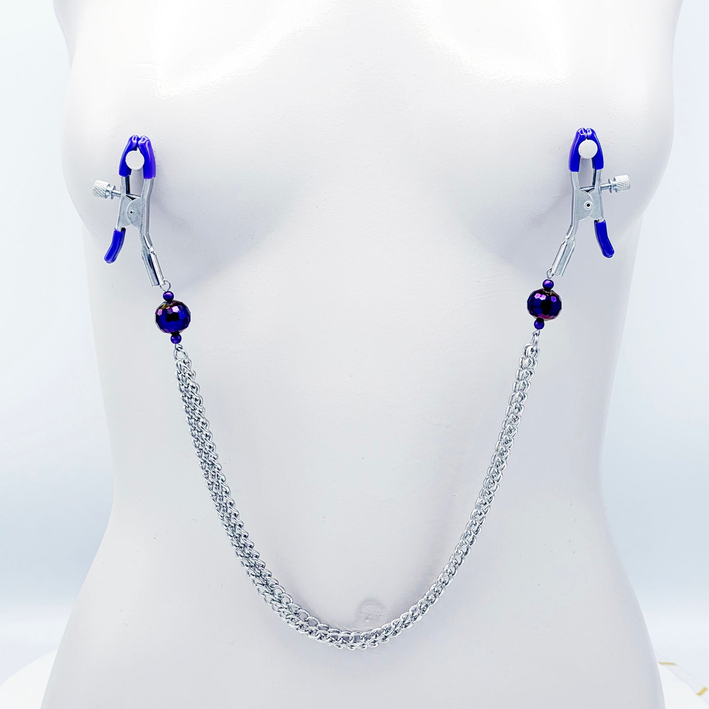 Adjustable Clamps, Purple, with Multiple Chains Attached.