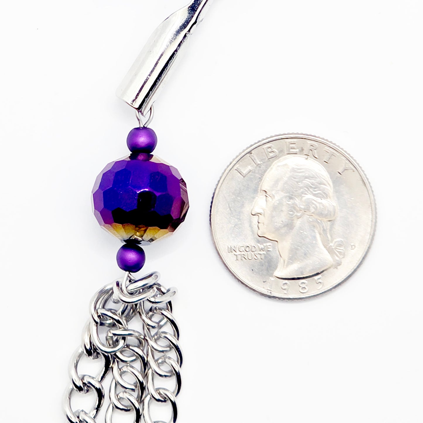 Adjustable Clamps, Purple, with Multiple Chains Attached.
