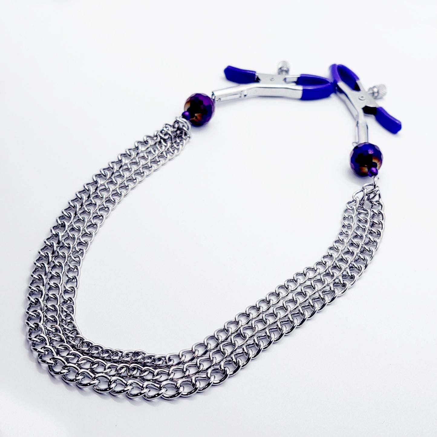 Adjustable Clamps, Purple, with Multiple Chains Attached.