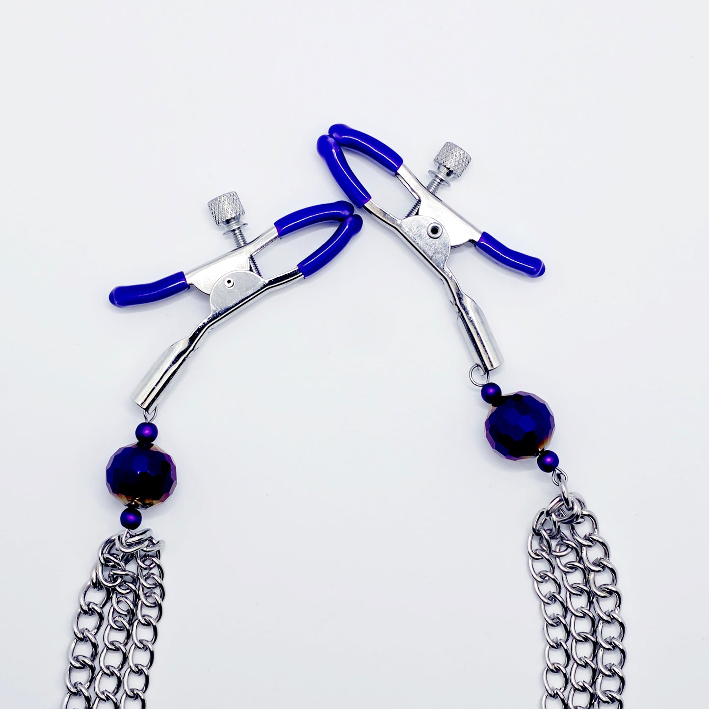 Adjustable Clamps, Purple, with Multiple Chains Attached.