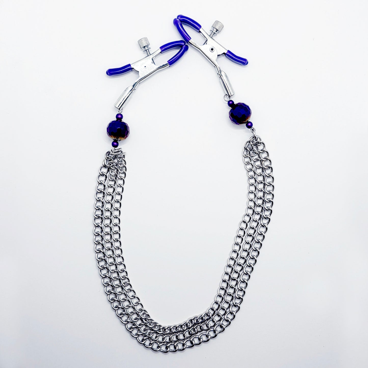 Adjustable Clamps, Purple, with Multiple Chains Attached.