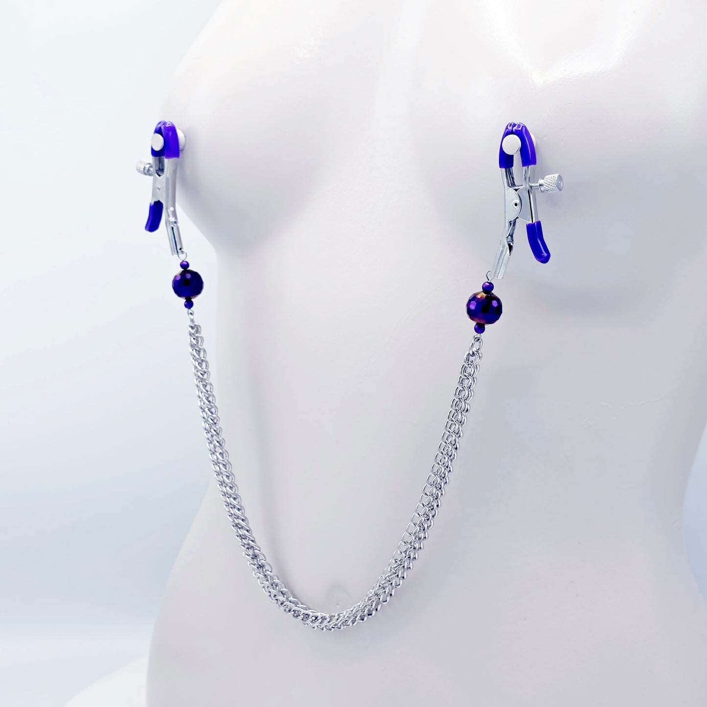 Adjustable Clamps, Purple, with Multiple Chains Attached.
