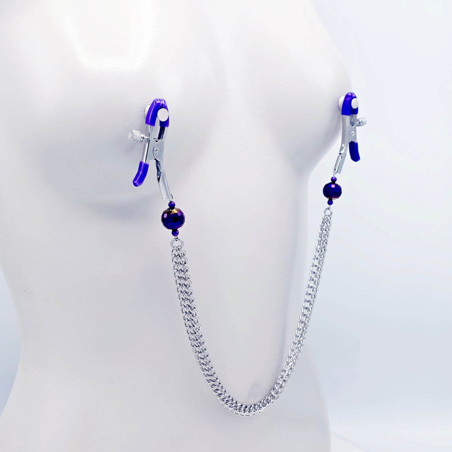 Adjustable Clamps, Purple, with Multiple Chains Attached.