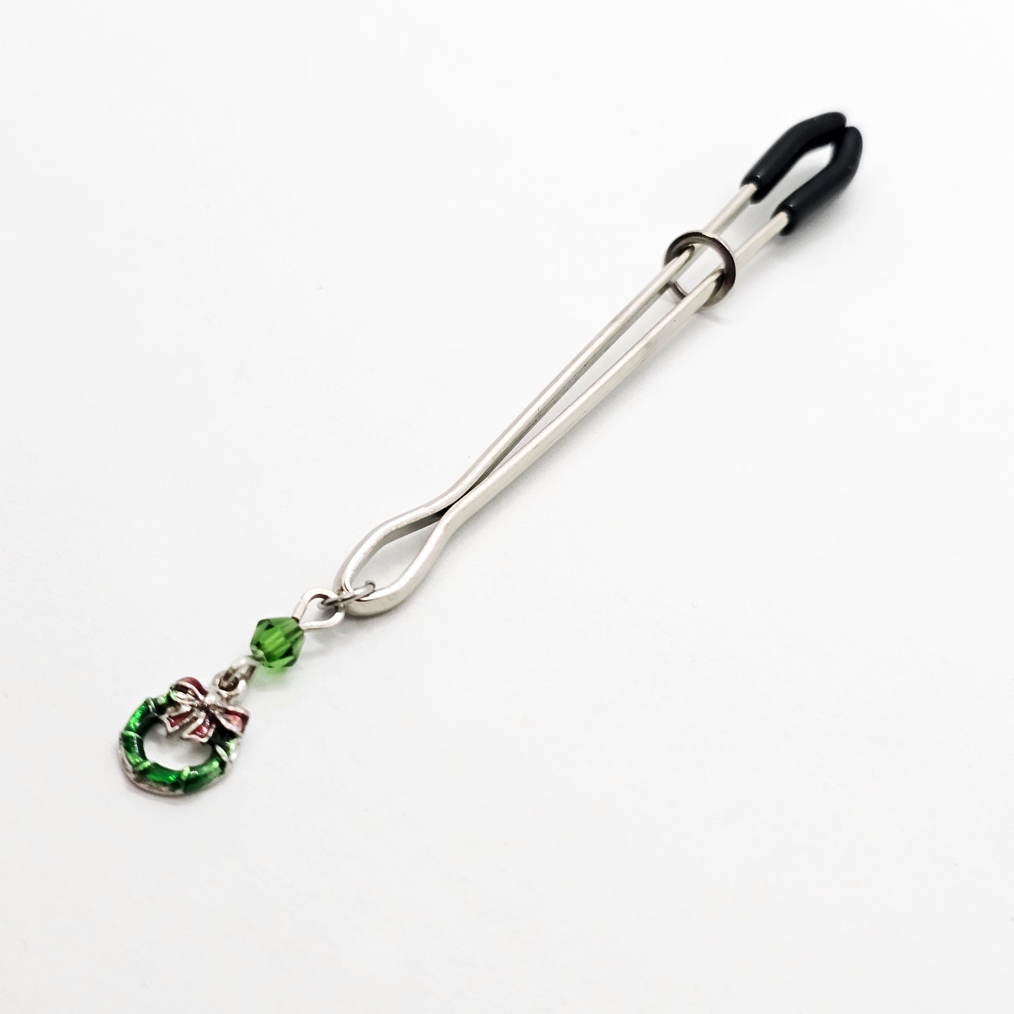 Holiday Clit Clamp Featuring Wreath and Green Chrystal. Tweezer Clitoral Clamp for Enhanced Stimulation.