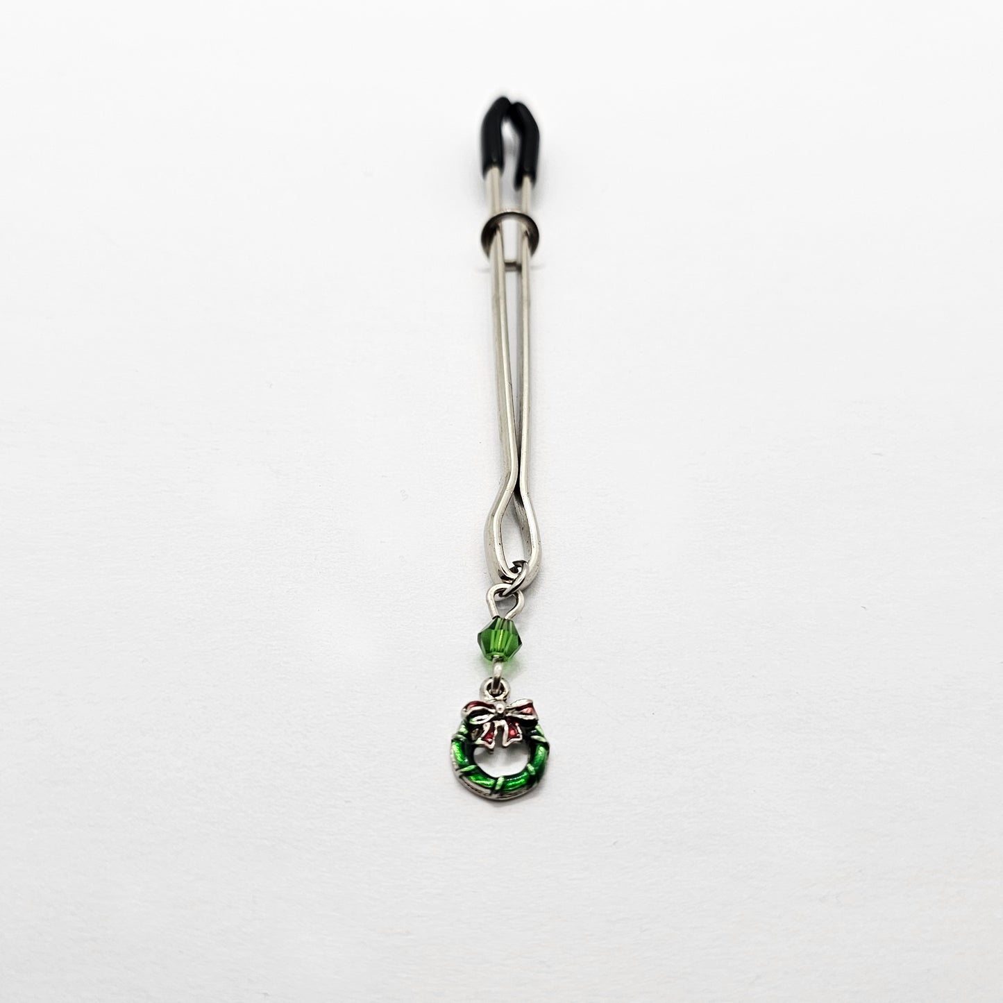 Holiday Clit Clamp Featuring Wreath and Green Chrystal. Tweezer Clitoral Clamp for Enhanced Stimulation.