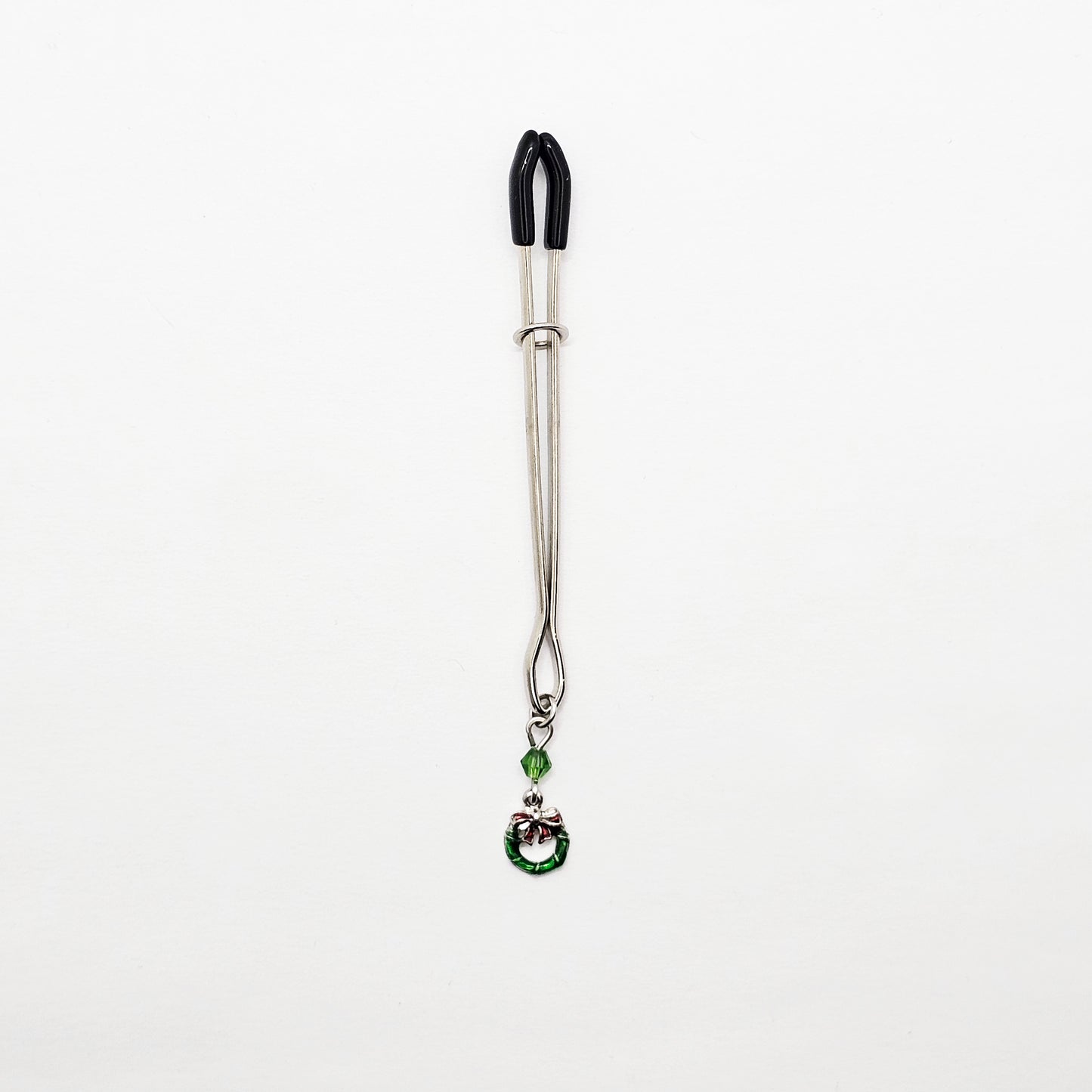 Holiday Clit Clamp Featuring Wreath and Green Chrystal. Tweezer Clitoral Clamp for Enhanced Stimulation.