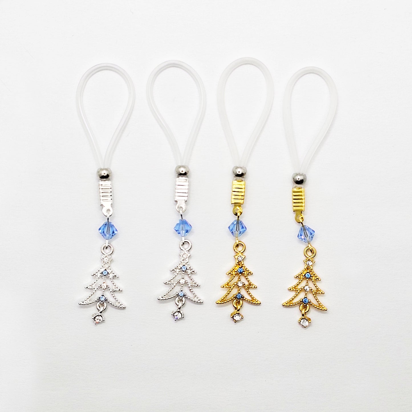 Non Piercing Nipple Nooses or Clamps with Festive Trees and Crystals. Five styles of Nipple Clamps to choose from.