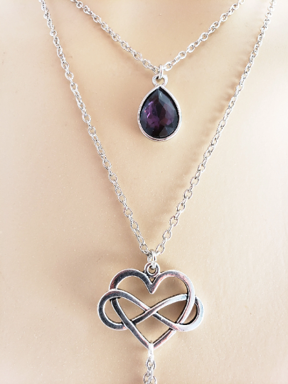 Poly Necklace with attached nipple nooses or feel the sting with nipple clamps. Poly amorous, Infinity Heart Multi Level Necklace