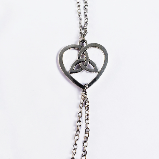 Celtic knot heart necklace with attached nipple nooses. Or feel the sting with one of our five types of nipple clamps. BDSM, Sex Toy