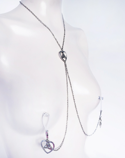 Celtic knot heart necklace with attached nipple nooses. Or feel the sting with one of our five types of nipple clamps. BDSM, Sex Toy