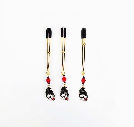 Nipple and Clit Clamp Set, Gold Tweezer Clamps with Red Crystal, Skull and Raven. MATURE, BDSM