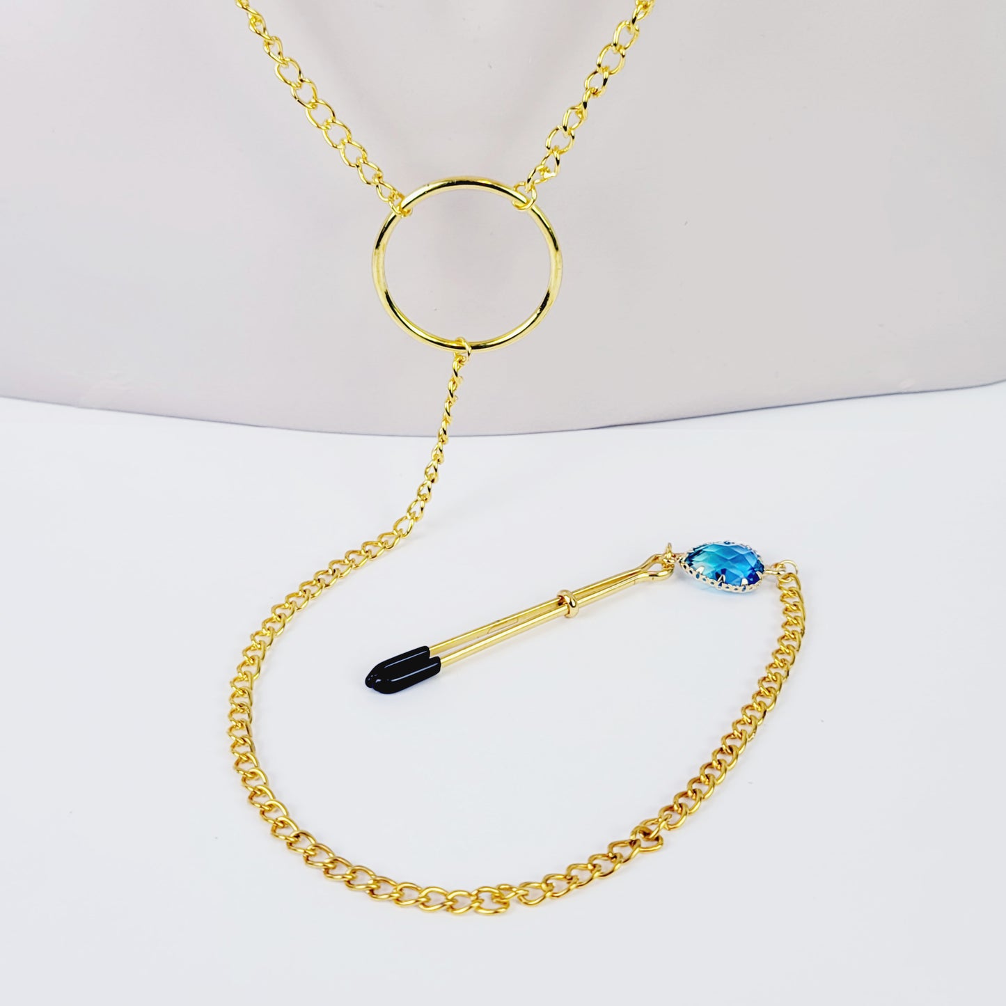 Nipple To Clit Clamps. Gold Tweezer Nipple Clamps, Chain Attached, with Tweezer Clitoral Clamp and Blue Gems. MATURE, BDSM