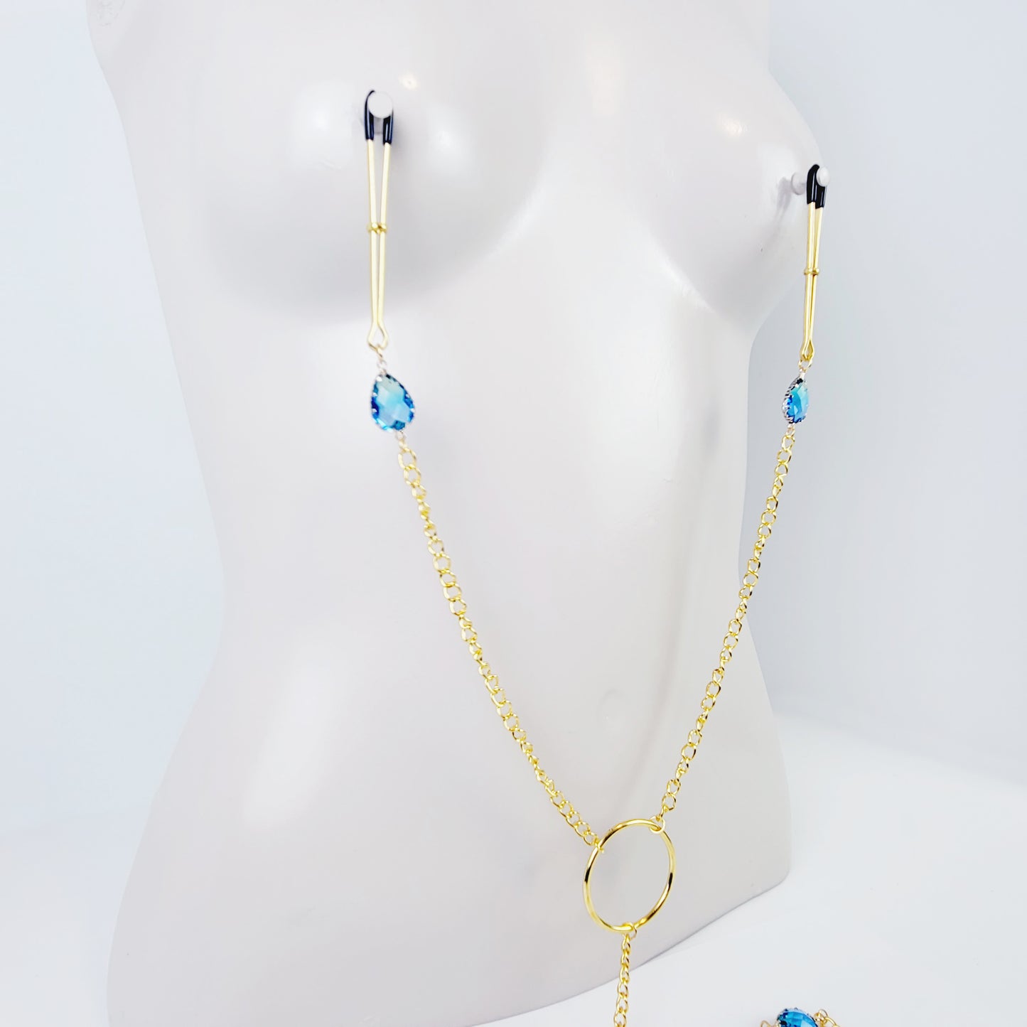 Nipple To Clit Clamps. Gold Tweezer Nipple Clamps, Chain Attached, with Tweezer Clitoral Clamp and Blue Gems. MATURE, BDSM