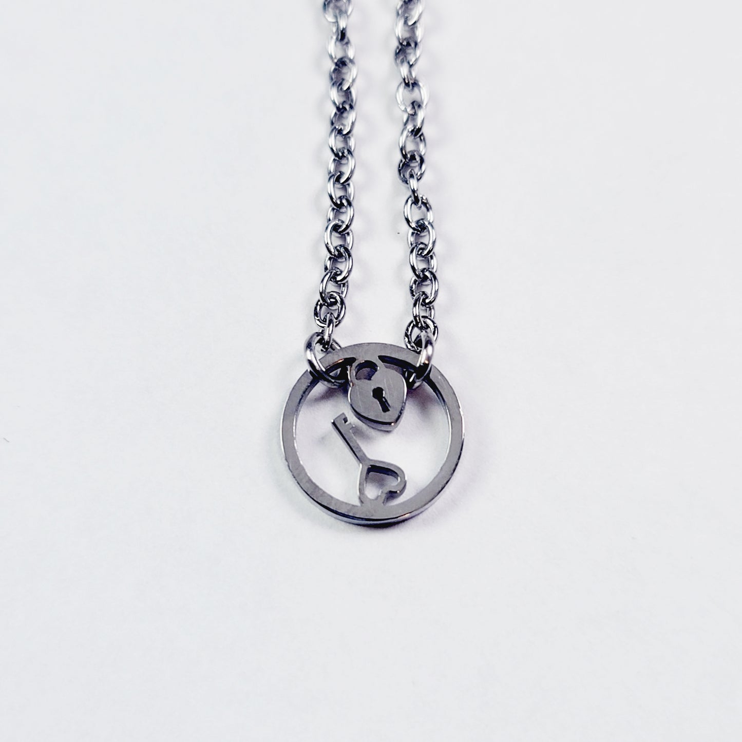 Day Collar, Stainless Steel with Circle of O Heart Locket and Key Pendant. 24/7 Wear Discreet Collar