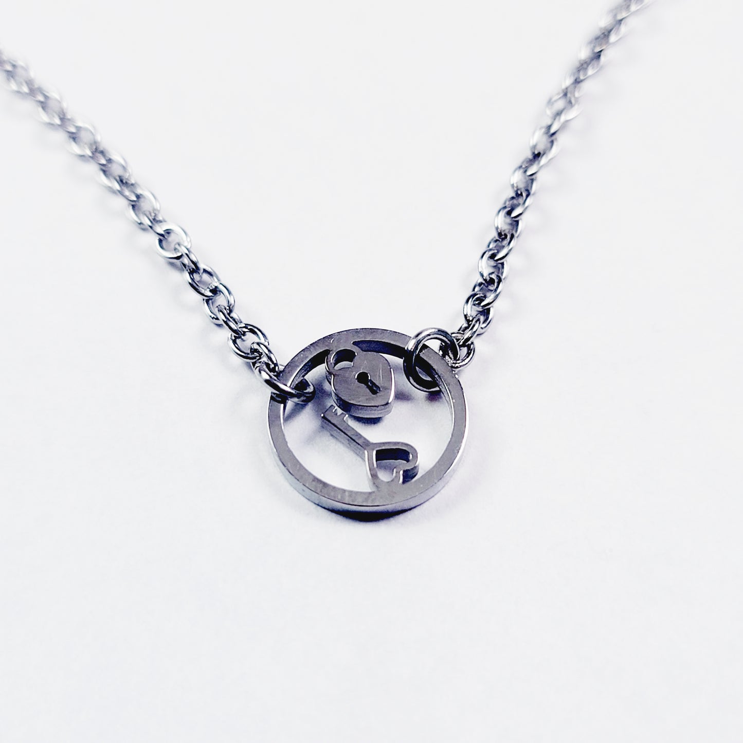 Day Collar, Stainless Steel with Circle of O Heart Locket and Key Pendant. 24/7 Wear Discreet Collar