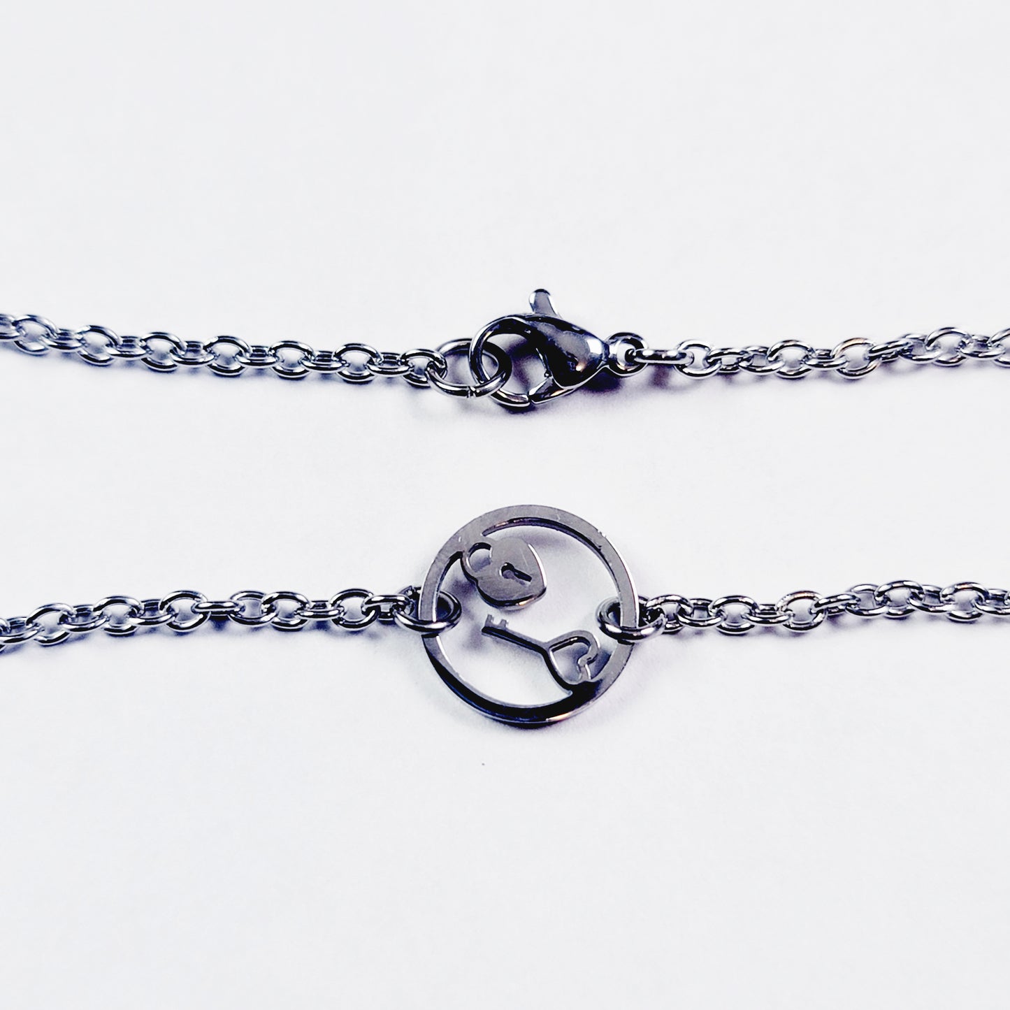 Day Collar, Stainless Steel with Circle of O Heart Locket and Key Pendant. 24/7 Wear Discreet Collar