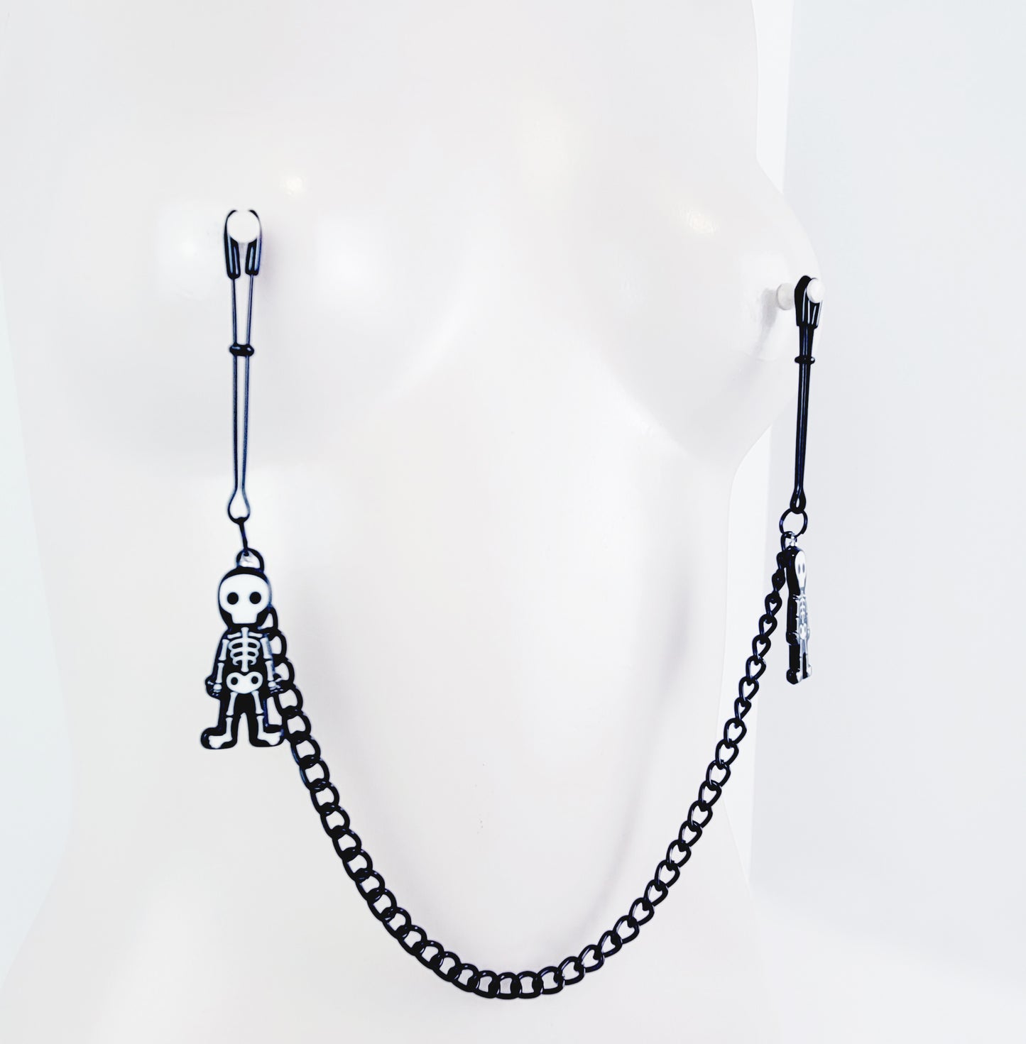 Nipple Clamps with Skeletons. Black Tweezer Clamps attached with Black Chain. Adult Toy for Nipple Play. Halloween, BDSM, MATURE