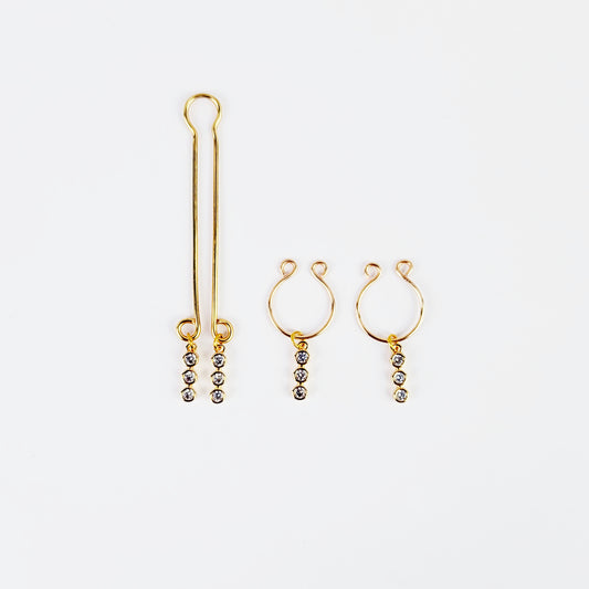 Gold Labia Clip and Horseshoe Style Nipple Rings with 18k Gold Tri Circle Gems.