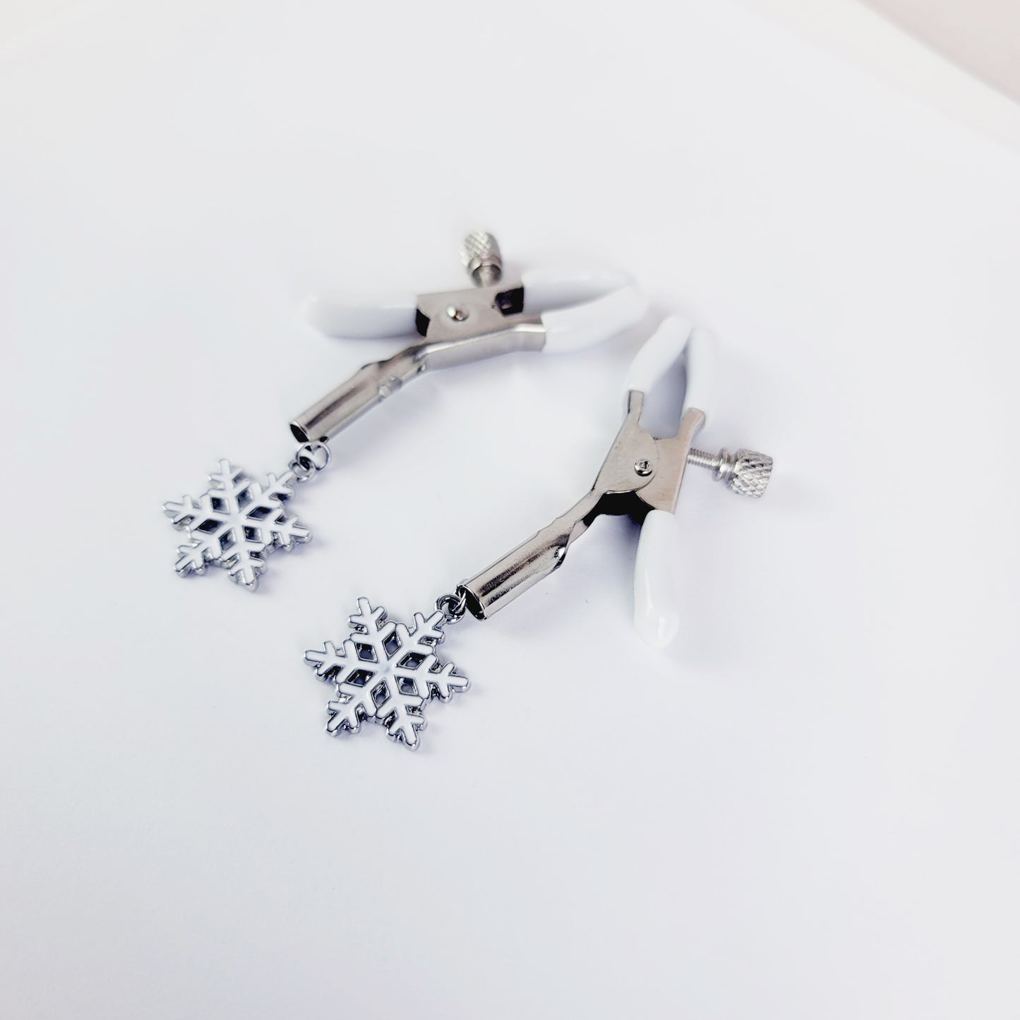 Adjustable Nipple Clamps, White with Snowflakes.