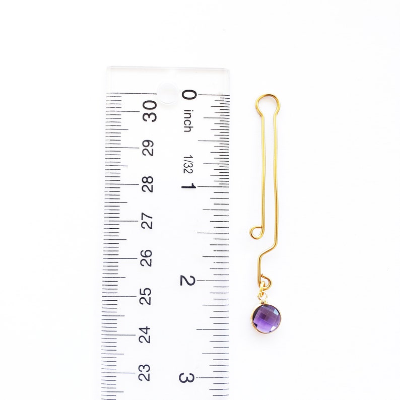 Labia Clip with Purple Crystal. Gold